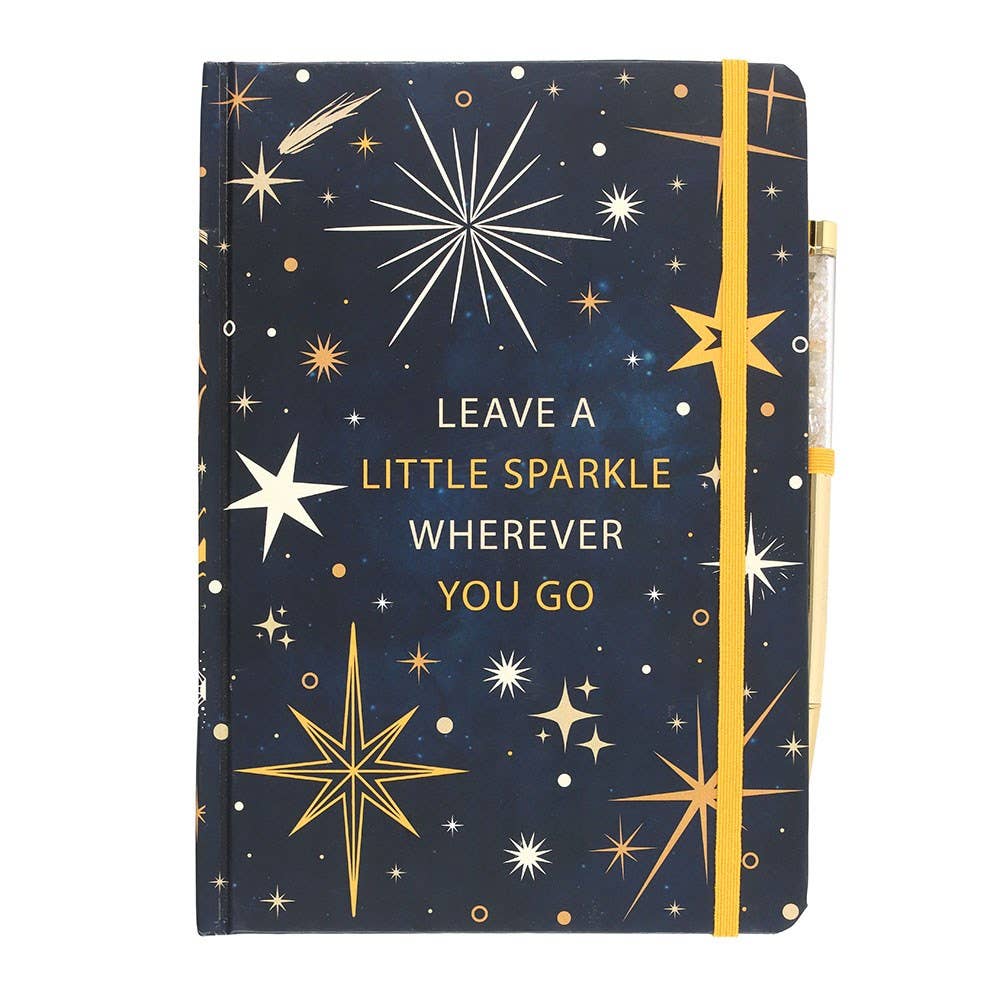 Notebook with starry design and motivational quote on a white background